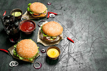 Fast food. Fresh burgers with cola.