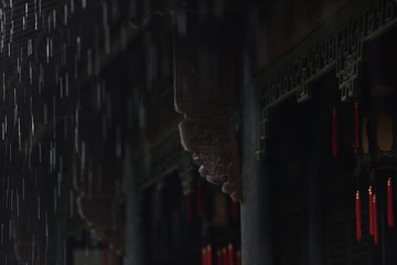 raindrops in line under Chinese traditional wood  architecture
