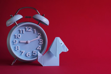 Dog Origami,gold coins,money envelope over red background.Chinese New Year 2018.Chinese Lunar Year of Dog.(Foreign text means prosperity,luck and wealth)