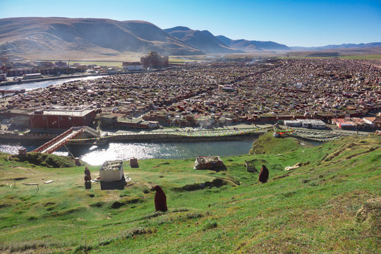 View of the Yarchen Gar Monastery with many shacks for monks in Garze Tibetan, Sichuan, China.