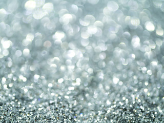 Silver Sparkling Glitter bokeh Background.