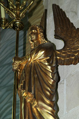 Obraz premium Angel candlestick made of copper