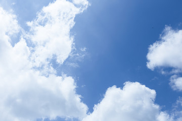 white clouds in the blue sky