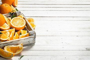 Fresh oranges in a box.