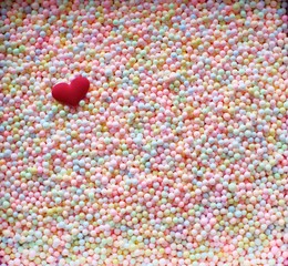 Valentine day love concept. Red Hart with Pastel polystyrene foam texture for background.