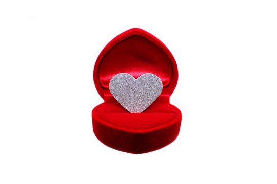  Silver glitter heart in wedding ring box. Valentines day present concept.