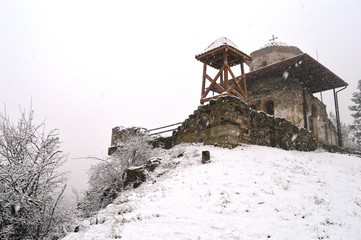 old ruined church in the snow
