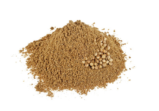 Coriander seeds and powder isolated on a white background