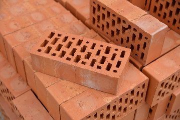 Obraz na płótnie Canvas Heap of red bricks