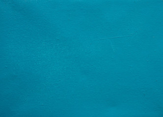 Blue canvas background. Stretched canvas rough texture. Blue teal painted canvas for navy banner template.