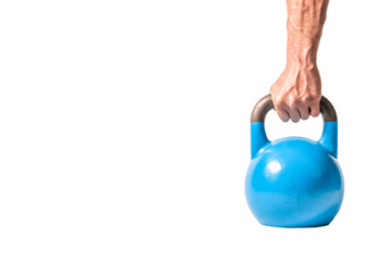Naklejka na ściany i meble Kettle bell sport, Strong muscular man hand with muscles holding blue heavy kettlebell partially isolated on white background