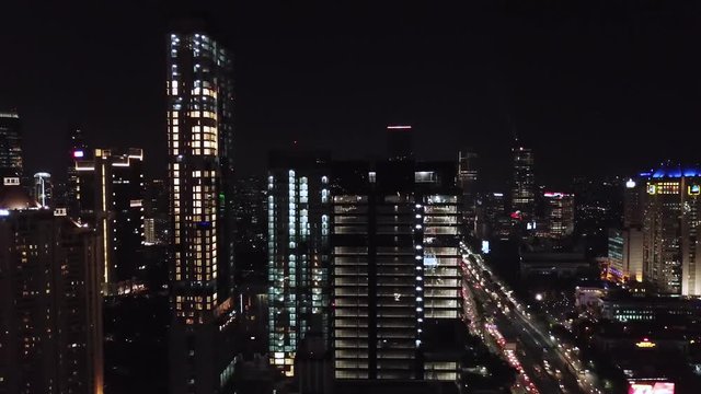 Drone view of Jakarta Central Business District cityscape at night
