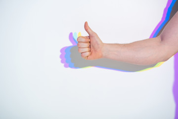 Good job. Close up man hand with painted reflection showing symbol ok. Positivity concept