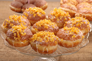 Traditional Polish donuts with filling and orange
