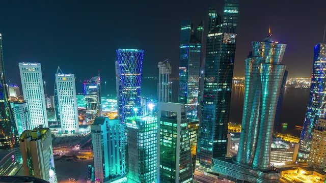 Doha Qatar skycreapers tall buildings timelapse night lights downtown streets, Middle East