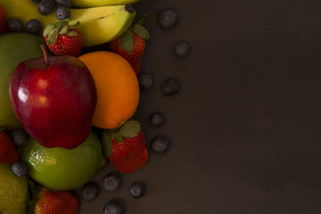 Beautiful Arragement of Various Fruit with Space to Add Your Own Writing