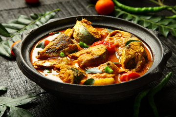 Traditional cuisine-  Fish curry with herbs and spices. seafood 