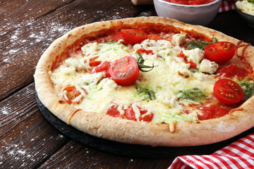 pizza with cheese fresh baked pizza coming out of the oven