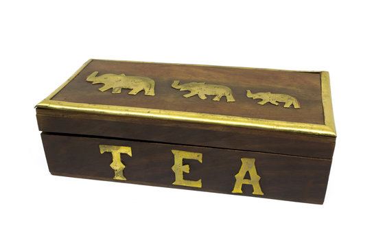 Wooden asian tea box with gold elephants isolated on white