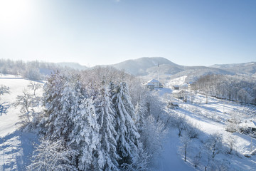 Village during snowy winter season.