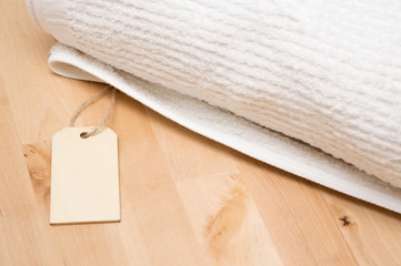 Towel and blank price tag or label