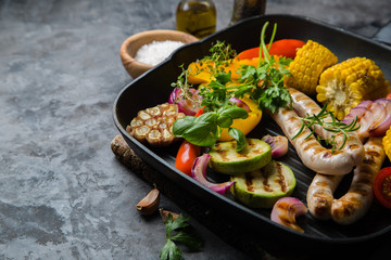 Barbeque sausages with vegetables