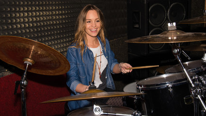 Fototapeta premium The women plays drums