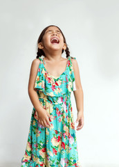cute asian kids girl screaming or laugh action on white background