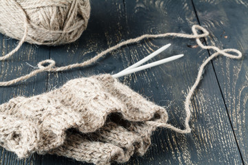Natural wool for knitting on table