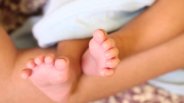 Newborn baby legs