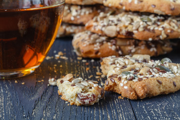 Cookies with nuts and seeds on table