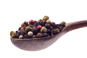 Seasoning - four kinds of pepper peas - isolated on white background