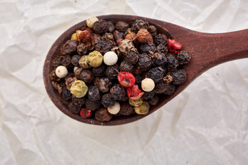 black pepper peas on a wooden spoon
