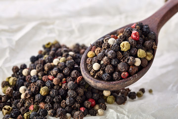 black pepper peas on a wooden spoon