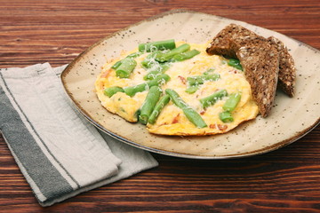 Scrambled eggs with green beans and toast, healthy and nutrition