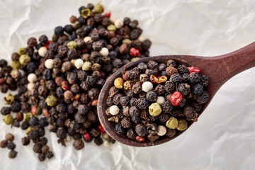 black pepper peas on a wooden spoon