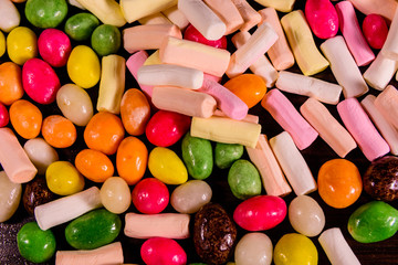 Background of the different multi colored candies. Festive concept