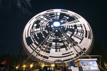 attractions in a night entertainment park, long exposure