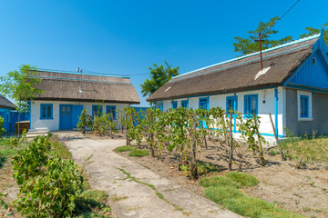Fototapeta na wymiar Letea, Danube Delta, Romania, August 2017: Traditional House in Delta Dunarii (Danube Delta) Romania