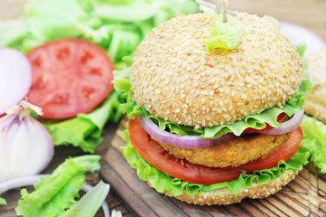 Veggie burger with chickpeas patty, vegan fast food, selective focus