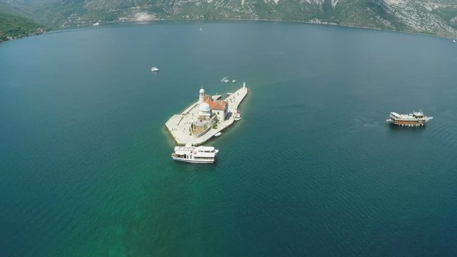 Aerial view of St. George island and old artificial island Gospa od Skrpjela in Perast, Bay of Kotor, Montenegro