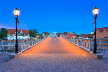 Catwalk over Motlawa river in Gdansk at dusk, Poland