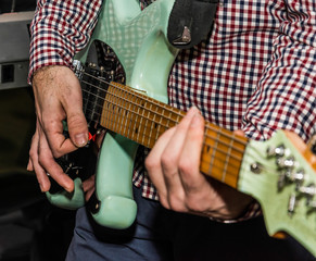 Fototapeta premium Close-up photo of guitar player 