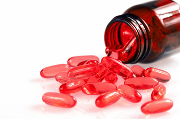Soft gelatin capsule on white background.