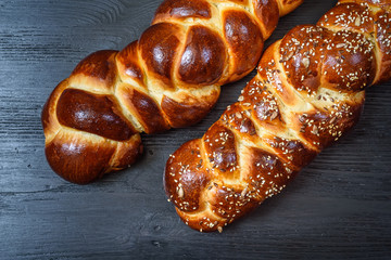 tasty challah on a wooden background
