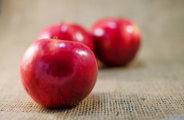 Apples on a limited background in the basket
