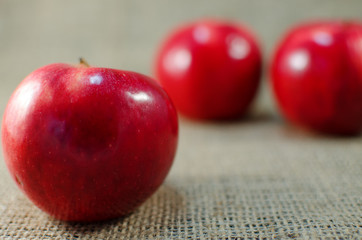 Apples on a limited background in the basket
