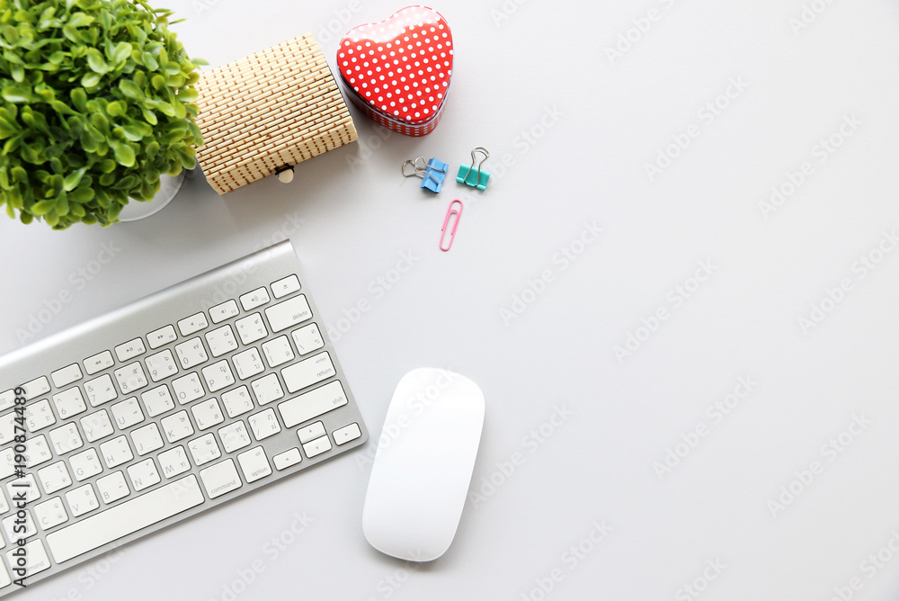 Poster top view keyboard,mouse on office desk.cup of coffee and supplies. top view with copy space.