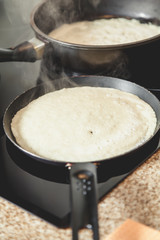 White pancake fry in  pan
