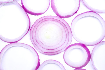 pattern of sliced purple onions food background, isolated on white background . closeup .